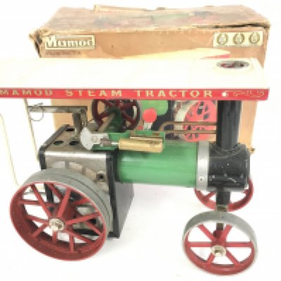 A Boxed Mamod Steam Tractor. Parts Missing and Box is Worn.