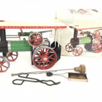 A Boxed Mamod Steam Tractor.