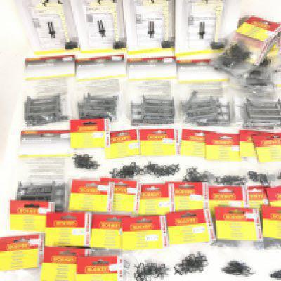 A Collection of Carded Hornby 00 Gauge Junction home Signals. couplings and other accessories. no Reserve.