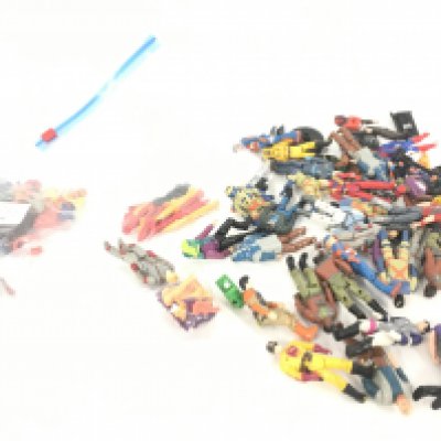 A collection of MASH figures and helmets.