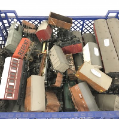 A Box Containing 00 Gauge Coaches and Rolling Stock. No Reserve.