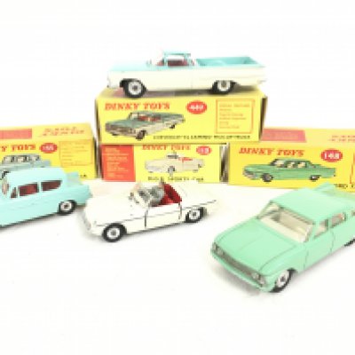 4 Boxed Dinky Vehicles. A Ford Anglia #155 a M.G.B. sports Car #113. A Chevrolet EL Camino Pick Up Truck #459 and a Ford Fairlane #148.
