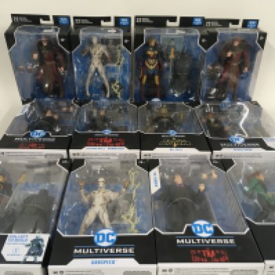 A collection of 12 sealed boxed DC McFarlane action figures