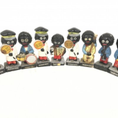 A Collection of 9 Robertson Figures. Notice from the&#2013265925&#2013265930the-saleroom.com:&#2013265925&#2013265930These items are listed on the basis they are illustrative of a bygone culture in which there were different social norms. We understand the potential controversy surrounding this type of item but believe that providing transparent information about historical context fosters greater understanding of our complex cultural history.