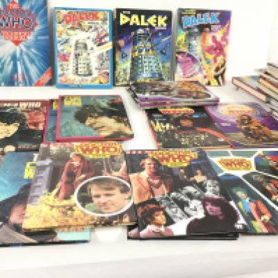 A collection of 29 Dr. Who annuals and books