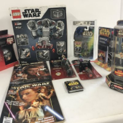 A collection of Star Wars toys and Lego.