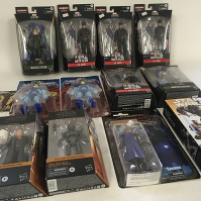 A collection of 12 boxed action figures including Star Wars..Marvel and Masters of the Universe.