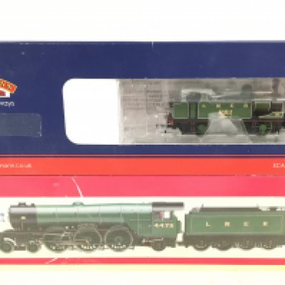 A Boxed Bachmann 00 Gauge J72 Tank LNER green #30-060B and a Hornby LNER AI Locomotive Flying Fox #R2549.