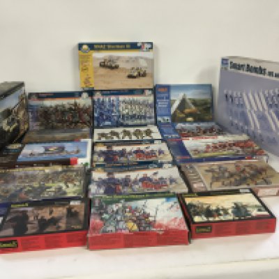A collection of new model kits by Italeri ..IMEX..Tamiya..and others. Mostly military related.
