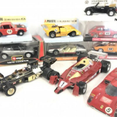 A Collection of Boxed And Loose Diecast including Burago. Nacoral and Polistil.