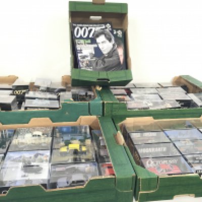 A collection in excess of 75 James Bond 007 cars all in display boxes complete with approximately 139 magazines by Fabbri entitled The James Bond Car Collection. (5)