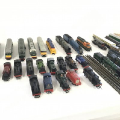 A collection of model railway engines..carriages ..wagons and track. All 00 gauge. Makers include Hornby..Triang etc.