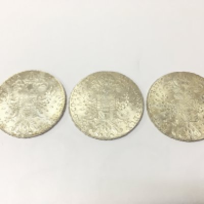 Three Austrian Maria Theresa Thaler silver coins , 84.4g total weight . Postage category A