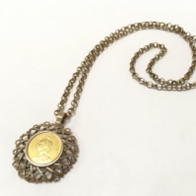 withdrawn - An 1889 sovereign in a 9ct gold mount with a 9ct gold belcher chain. 35.3G total weight. Postage category A