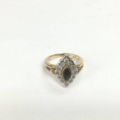 A 9ct gold, diamond and sapphire cluster ring, approx 5g and approx size M. Shipping category A.