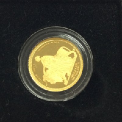 A gold quarter sovereign.