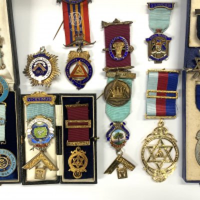 A collection of Silver Gilt and enamel Masonic jewels. (12).