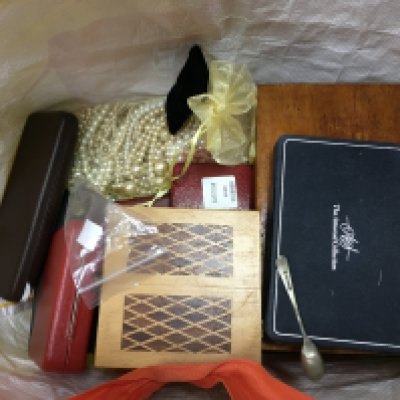 A mixed collection of costume jewellery including necklaces, brooches etc