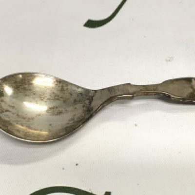 A silver hallmarked caddy spoon.