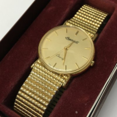 A 9ct gold cased Ingersoll watch . Total watch weight 37g. Postage catA