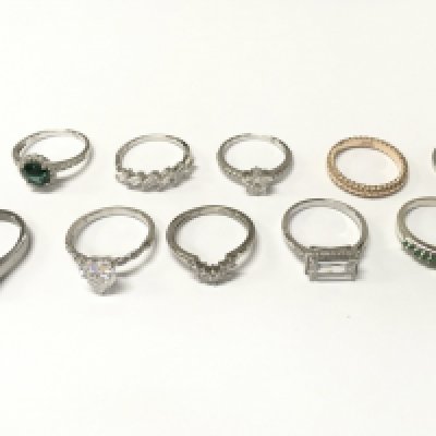 A collection of silver rings , also including bronze and stainless steel. Mostly size P. Postage category A