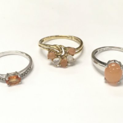 Three 9 carat gold rings including a white gold peach moonstone ring, pearl peach and opal cluster and citrine . 6g total weight. Size P-O, Q, O. Postage category A