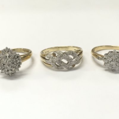 Two 9 carat gold rings (white stone cluster and knot ring) and one 14ct gold ring cubic zirconia cluster ring. Total weight 8.6g . Sizes R & Q.Postage category A