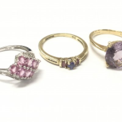 9ct gold rings including a white gold pink sapphire and diamond chip ring size N, pink amethyst cocktail ring size P, Tanzanite pink sapphire and diamond chip ring size R/Q. 7.6g total weight. postage catA