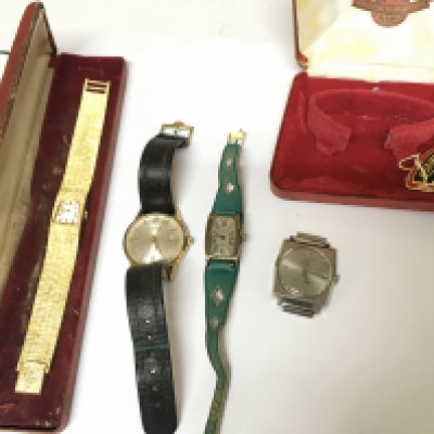 A collection of four watches including Roamer etc.