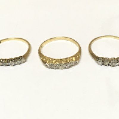 Three unmarked diamond 5 stone rings. Approximately 5.4g and sizes M M 1/2 and K