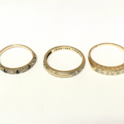 Three unmarked rings set with various gems. Approximately 6.3g and sizes M O and P