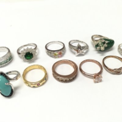 A Collection of silver rings sizes O and P. 55g total weight approximately. Postage category A