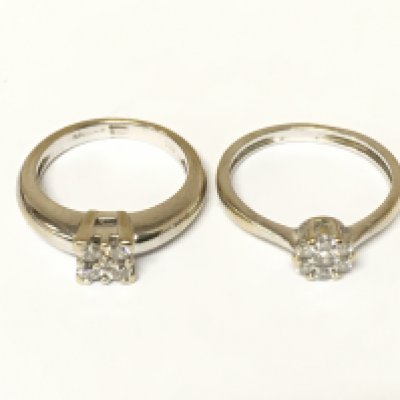 A pair of silver hallmarked corinthian column Candlesticks ,23cm tall.postage category B