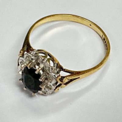 A 9ct gold diamond and sapphire set ring, approx weight 2.13grams. Approx size P.