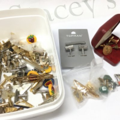 A Collection of Cufflinks . Postage category b