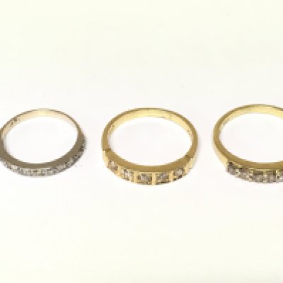 Three 18ct gold half hoop diamond rings. Approximately 8.3g sizes K and P