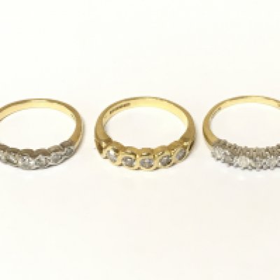 Three 18ct gold half hoop diamond rings. Approximately 9.3g and sizes M O P