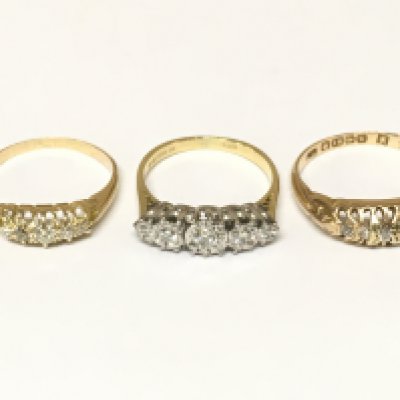 Three 18ct gold 5 stone diamond rings. Approximately 6.9g and sizes J K and O