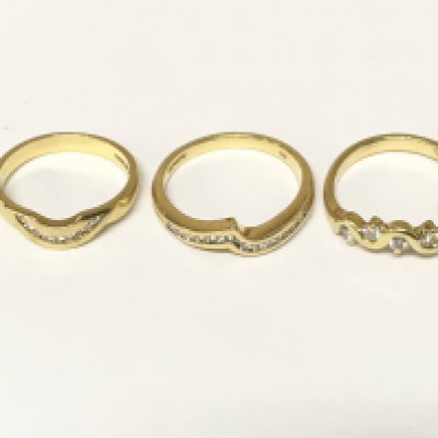Three 18ct gold diamond set rings. Approximately 9g sizes J and M