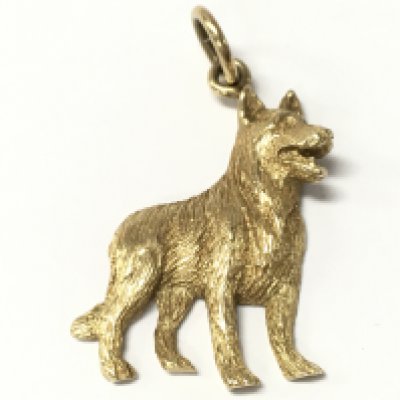 A 9ct gold dog pendant , 6.1g total weight. Postage catA
