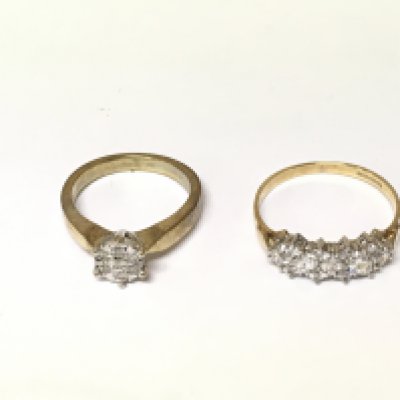 A 9ct diamond cluster ring size L and a 9ct gold CZ set ring size R. Total weight 5.41g
