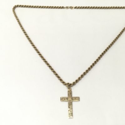 A gold chain with cross pendant . Total weight 6.1g . Postage category A