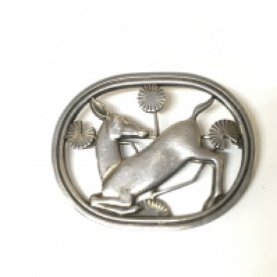 A Georg Jensen Deer with flowers brooch design number 256.
