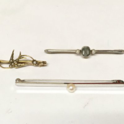 Three art deco style bar brooch&#2013266057۪s set with seed pearls.
