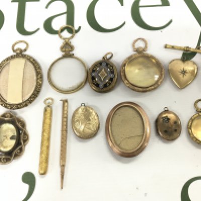 A mixed lot of rolled gold Victorian jewellery , mourning brooches, pens . Postage category A