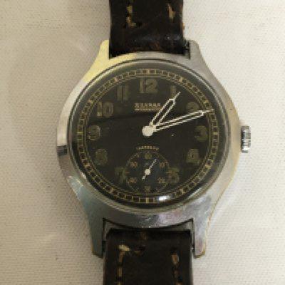 A Military watch Maker Silvana Animatic circa 1940 black dial with illuminating batons second subsidiary dial the reverse stamped Made in England London made. Watch seen working.