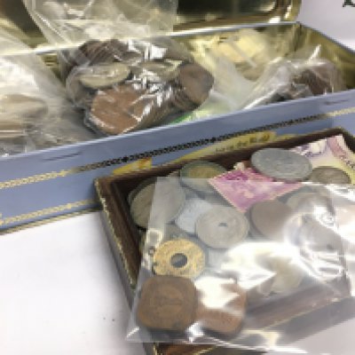 A tin and box of World coins . Postage catB