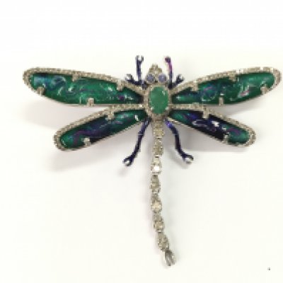 Silver dragonfly brooch set with emerald tanzanite eyes and diamonds with enamel wings. Emerald 0.57ct diamonds 1.41ct and tanzanite 0.18ct