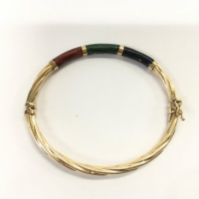 A 9ct gold bangle. 5.88g approximately Postage A