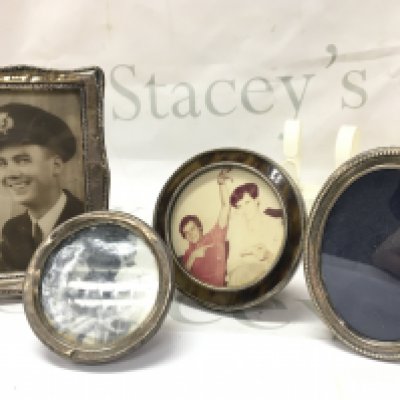 Four silver hallmarked frames . This lot cannot be posted